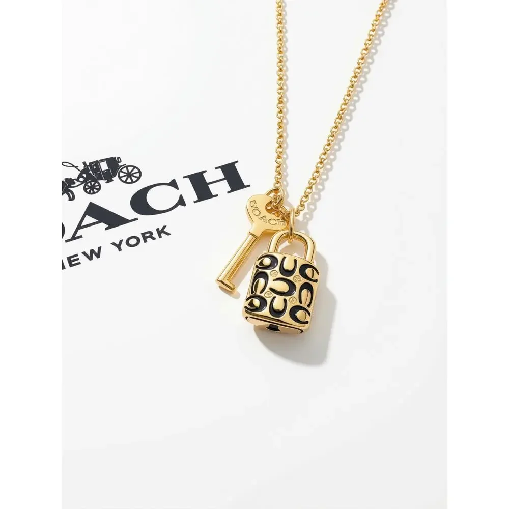 Coach Quilted Monogram Padlock & Key gold-tone necklace